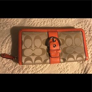 COACH -- Coral Zip Around Buckle Wallet